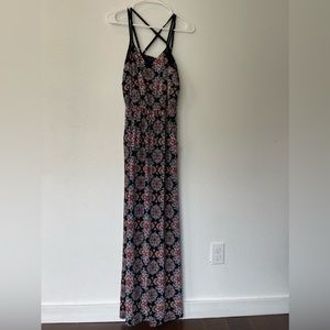 Black maxi dress with a colorful Paisley pattern